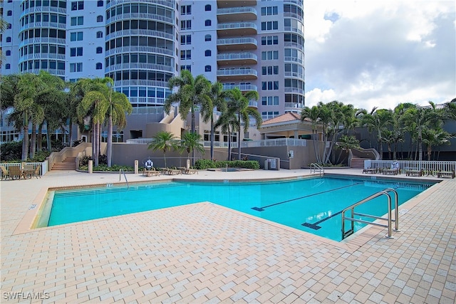 view of pool featuring a patio area