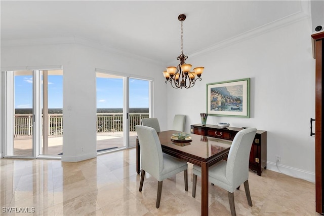 dining room with crown molding and an inviting chandelier