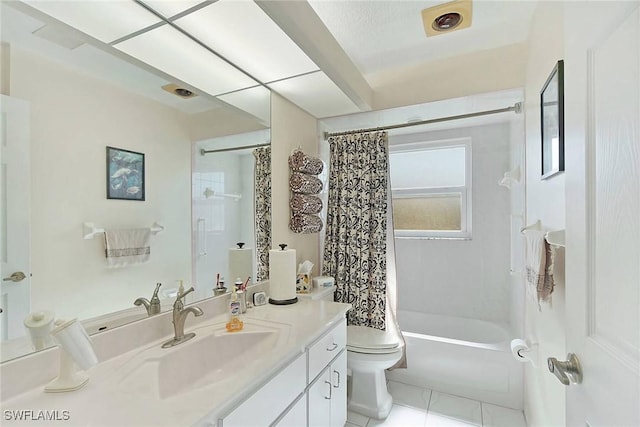 full bathroom featuring tile patterned flooring, vanity, shower / tub combo, and toilet