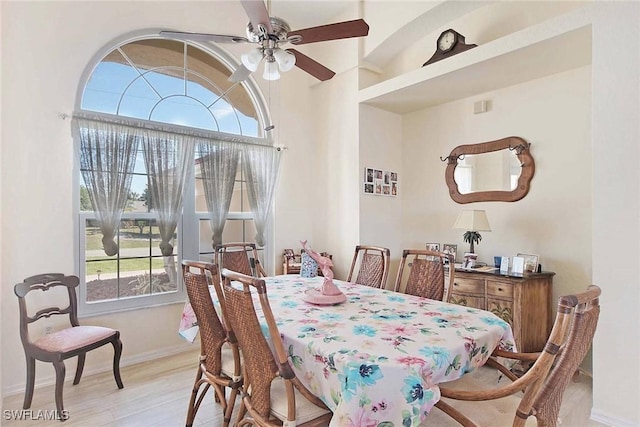 dining room featuring ceiling fan and light wood-type flooring