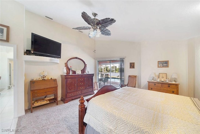 bedroom featuring access to exterior, light carpet, and ceiling fan