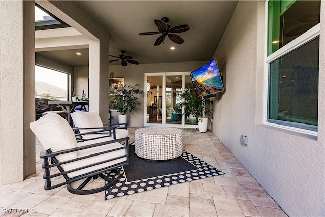 view of patio with ceiling fan