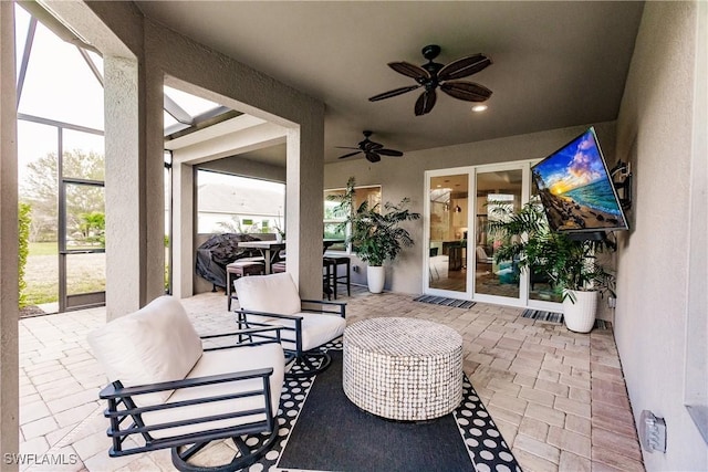 view of patio / terrace with ceiling fan