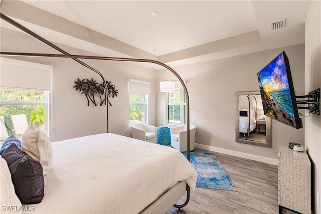 bedroom with light hardwood / wood-style flooring