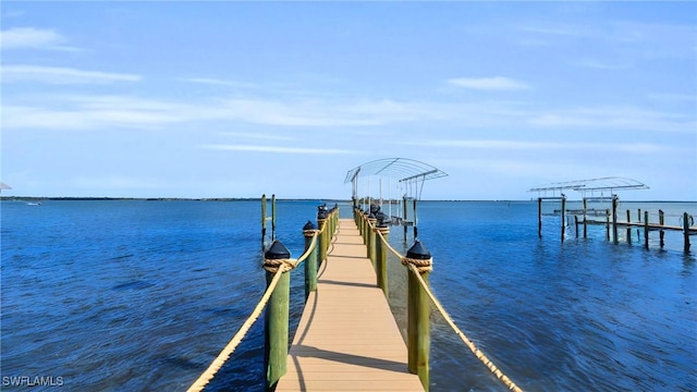 dock area featuring a water view and boat lift