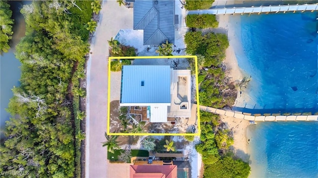 drone / aerial view featuring a water view