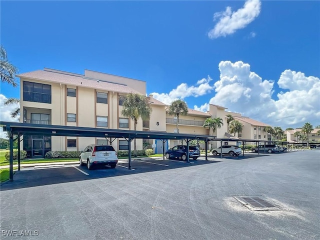 13276 White Marsh Ln Unit 3524, Fort Myers, FL 33912 - view of property with covered parking