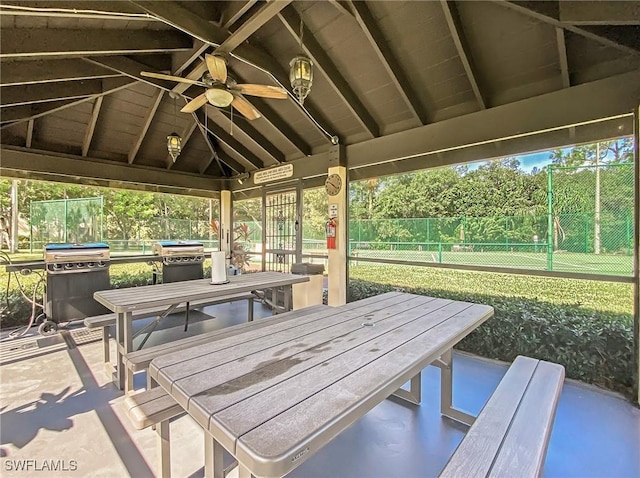 view of patio / terrace with a gazebo, ceiling fan, area for grilling, and a trampoline