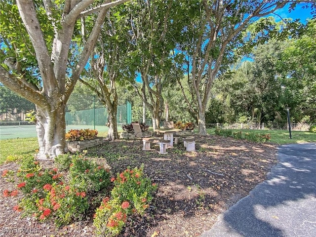 13276 White Marsh Ln Unit 3524, Fort Myers, FL 33912 - view of yard featuring view of wooded area