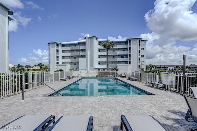 view of swimming pool featuring a patio