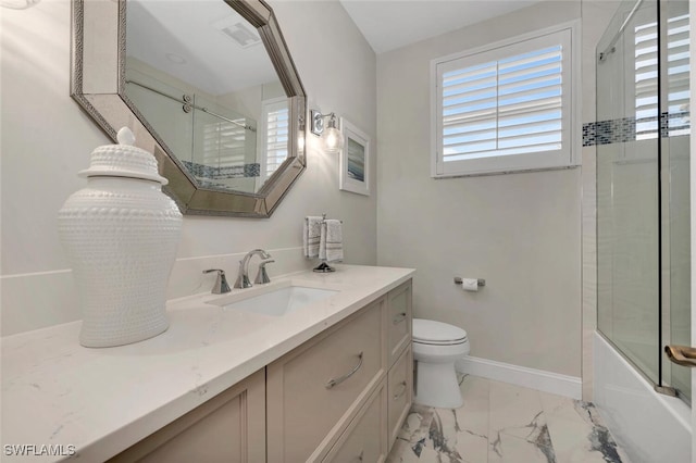 bathroom with toilet, visible vents, vanity, baseboards, and marble finish floor