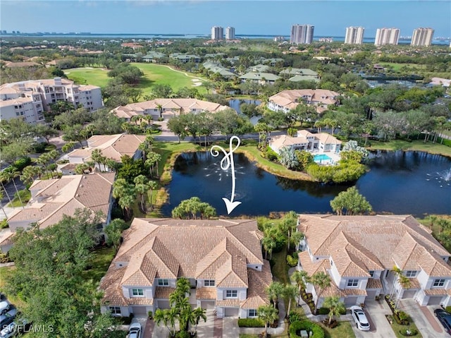 bird's eye view featuring a residential view and a water view