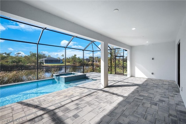 view of swimming pool with a water view