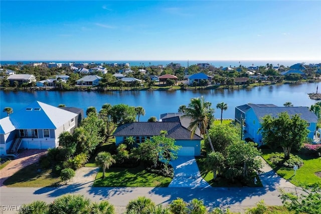 birds eye view of property featuring a water view