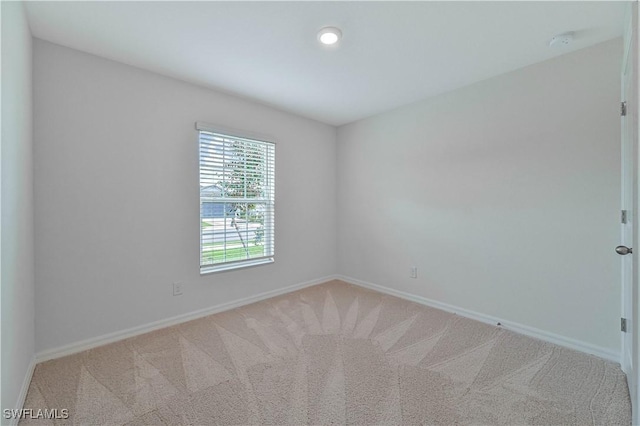 view of carpeted spare room