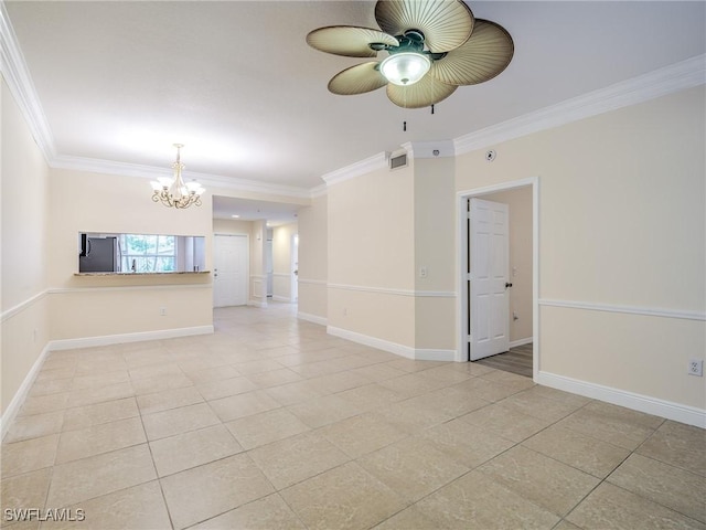 tiled spare room featuring ceiling fan with notable chandelier and ornamental molding