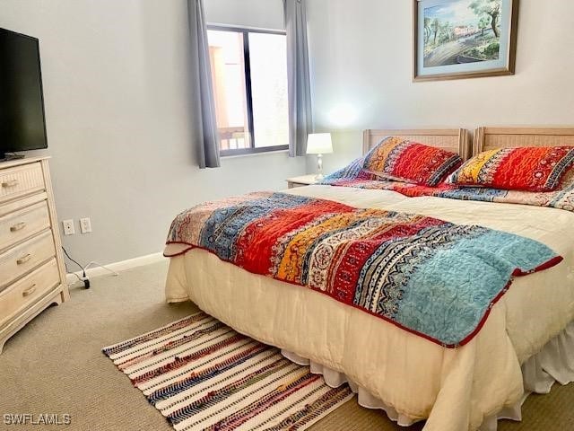 bedroom featuring carpet flooring