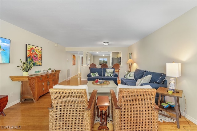 living room with light wood-type flooring