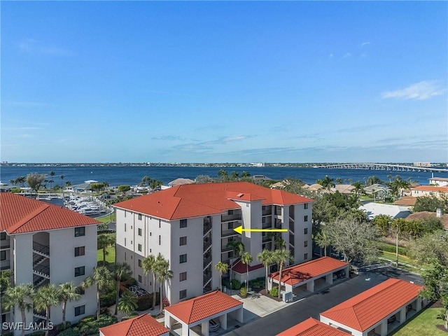 drone / aerial view featuring a water view