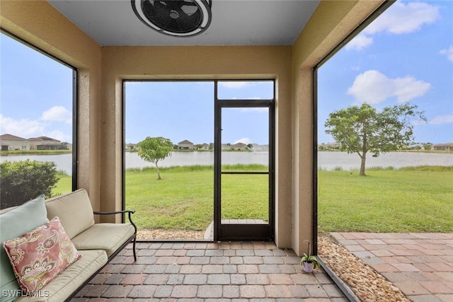 sunroom with a water view