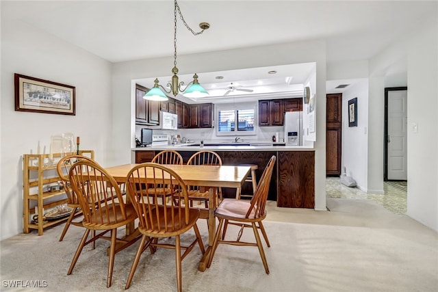 dining area featuring a tray ceiling