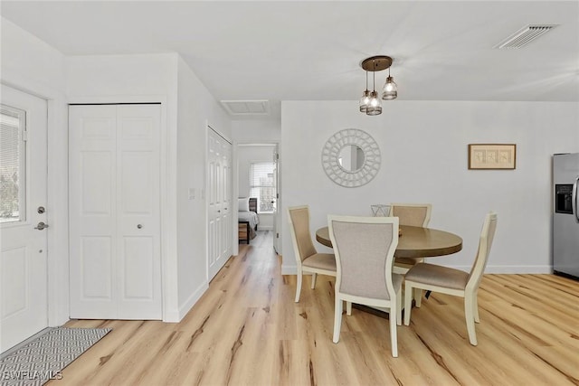 dining area featuring light hardwood / wood-style floors