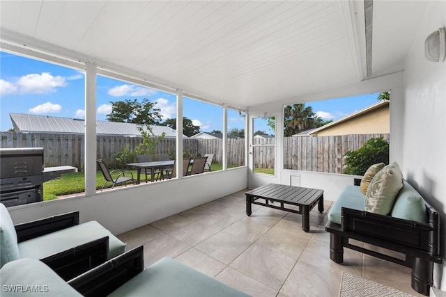 sunroom / solarium with a wealth of natural light