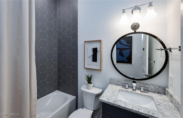 full bathroom with vanity, toilet, and tiled shower / bath combo