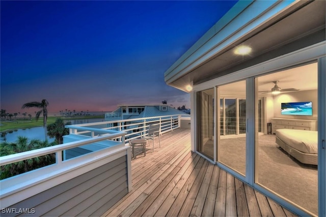 deck at dusk with a water view