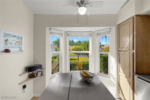 dining room featuring ceiling fan