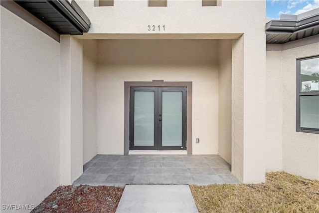 doorway to property with french doors