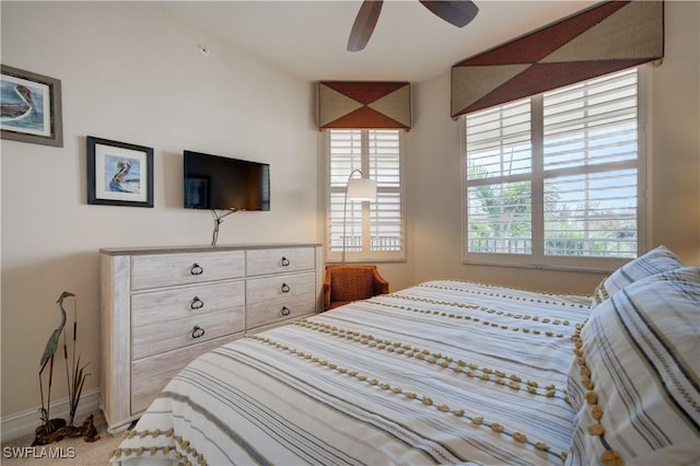 bedroom featuring carpet and ceiling fan