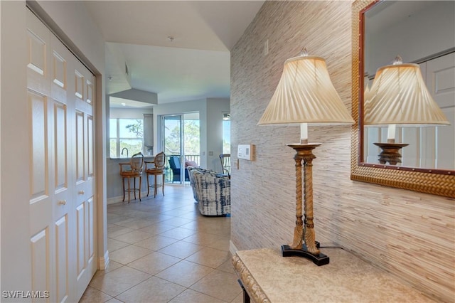 corridor featuring tile patterned flooring