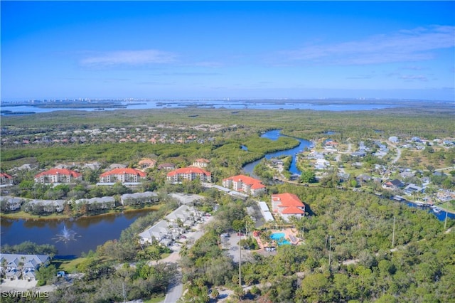 bird's eye view with a water view