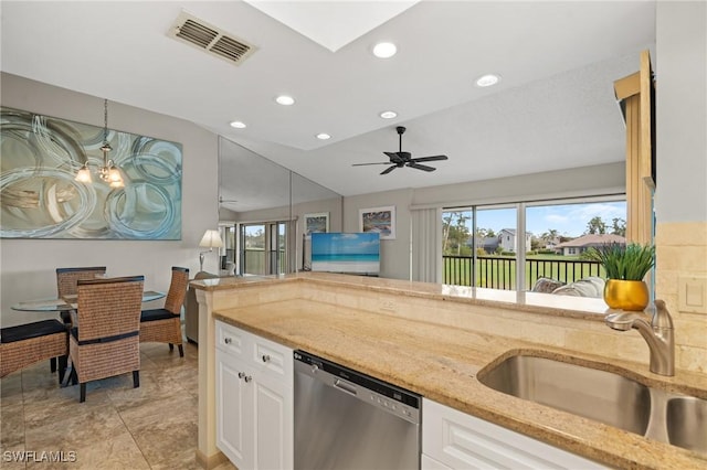 kitchen with ceiling fan, sink, stainless steel dishwasher, pendant lighting, and white cabinets