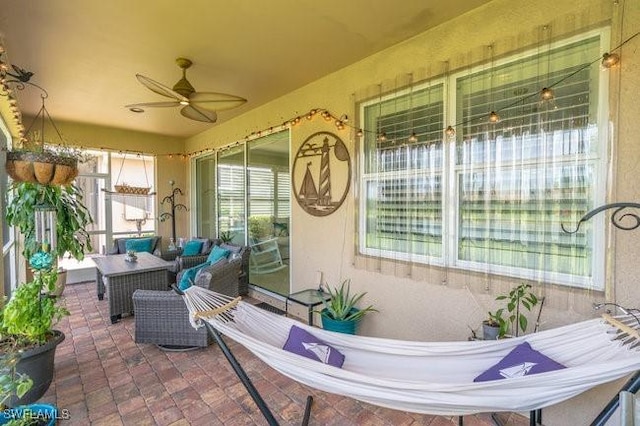 view of patio / terrace featuring ceiling fan and an outdoor hangout area