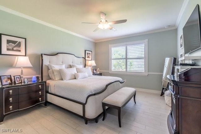 bedroom with light hardwood / wood-style floors, ceiling fan, and ornamental molding