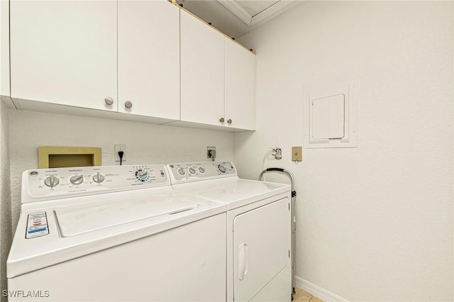 washroom with cabinets and separate washer and dryer