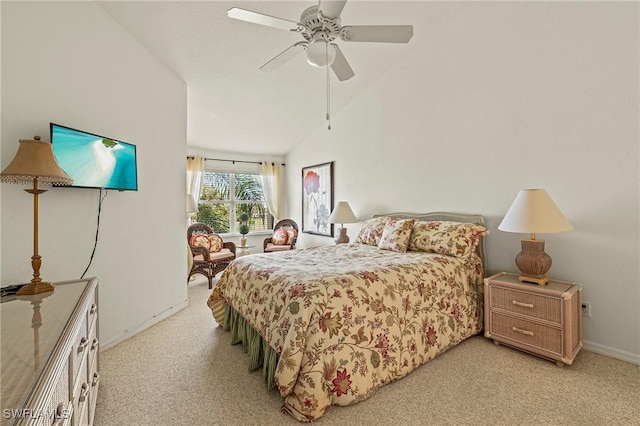 bedroom with light carpet, vaulted ceiling, and ceiling fan