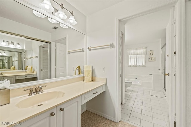 full bathroom featuring tile patterned floors, vanity, toilet, and plus walk in shower