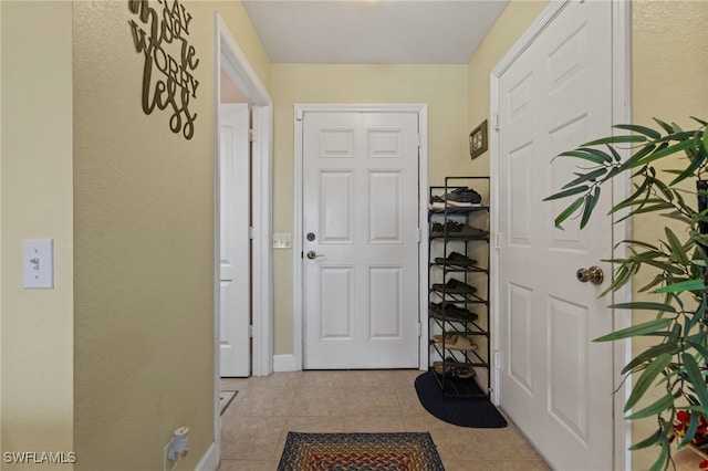 interior space featuring light tile patterned flooring