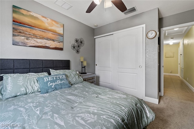 bedroom featuring carpet flooring, ceiling fan, and a closet