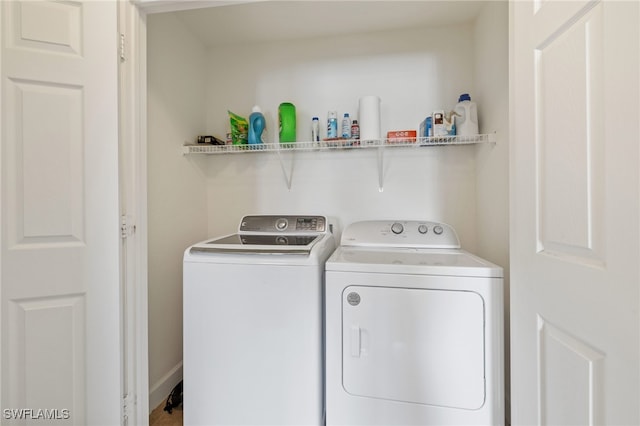 laundry area with washer and clothes dryer