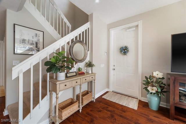 entrance foyer with dark hardwood / wood-style flooring