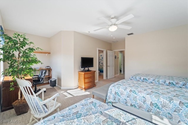 bedroom with light carpet and ceiling fan