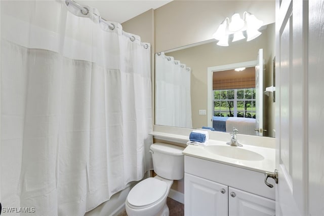 full bathroom with toilet, shower / tub combo, and vanity