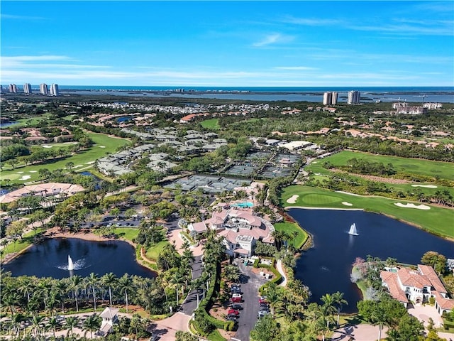 aerial view featuring a water view and golf course view