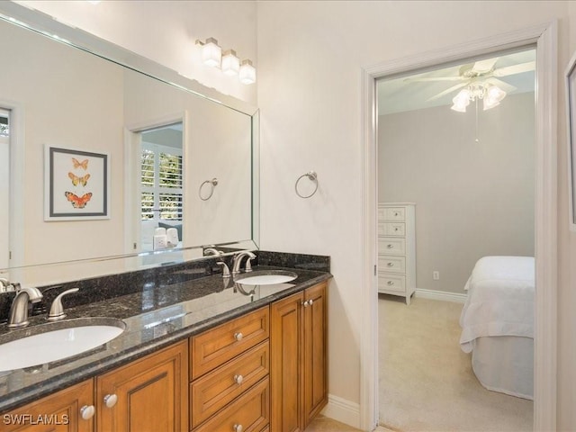 bathroom with vanity and ceiling fan