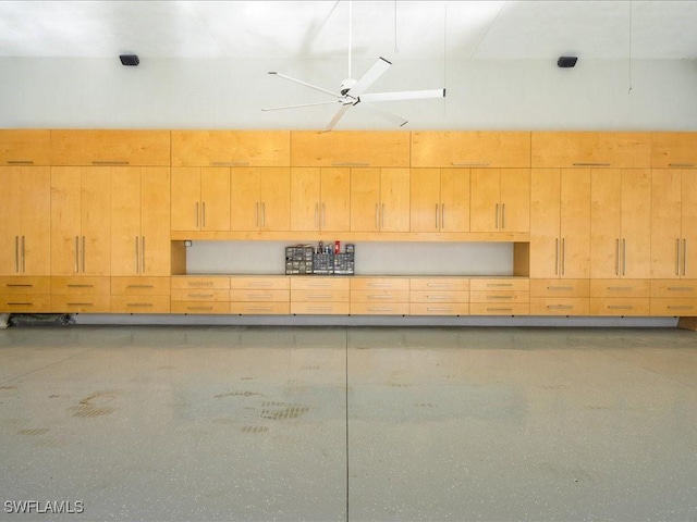 interior space featuring ceiling fan