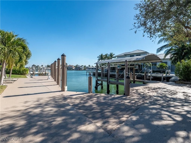 dock area with a water view